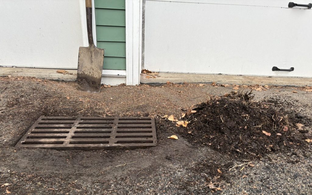 Outdoor Water Management - Driveway Drain Cleanout